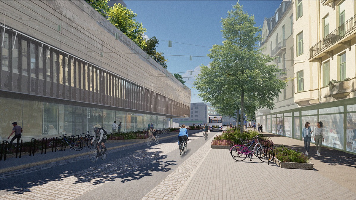 Illustration i gatuvy av en ombyggd stadsgata med breda gångytor, cykelbanor och planteringar; människor promenerar och cyklar längs butiksfasader och moderna byggnader under träd och ljusslingor.