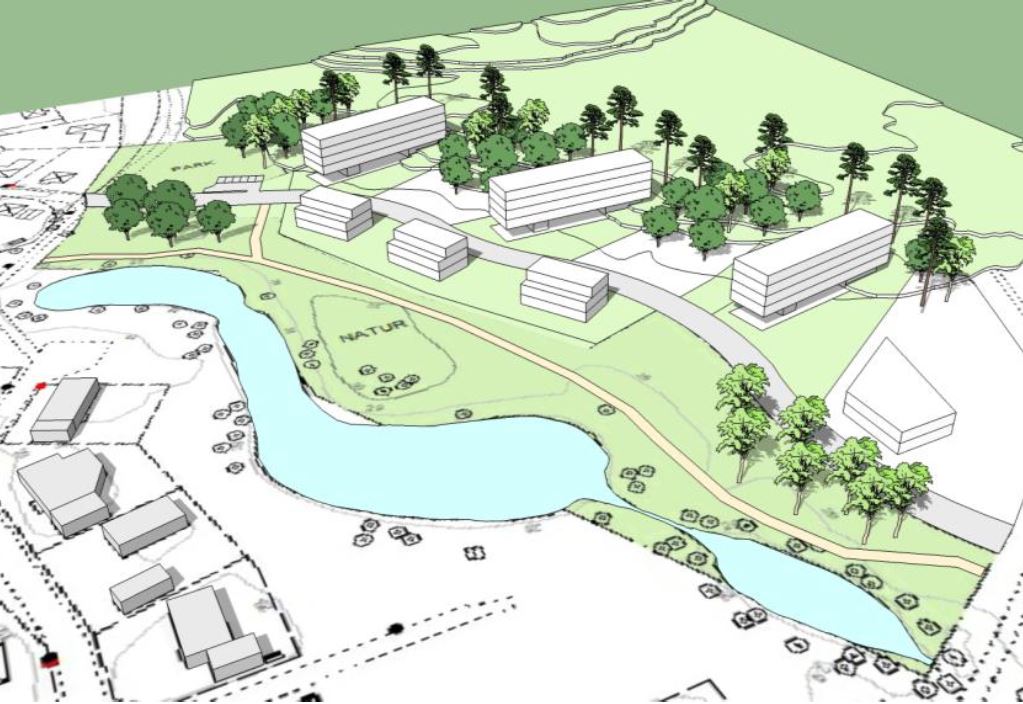 Illustrationsskiss som visar området Östra Ringstorp. Bilden visar en planritning med flera byggnader omgivna av träd och grönområden. En slingrande väg går genom området, och en vattenkropp syns i nedre delen av bilden.